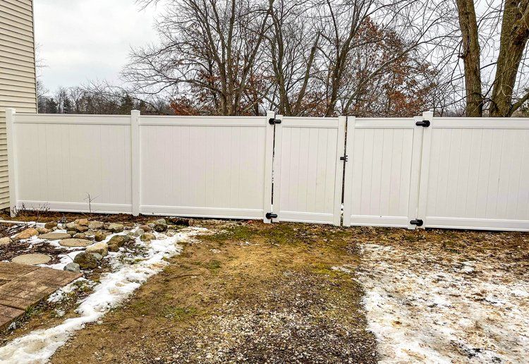 Enhancing Curb Appeal: A Guide to Fence Installation for Michigan Homes